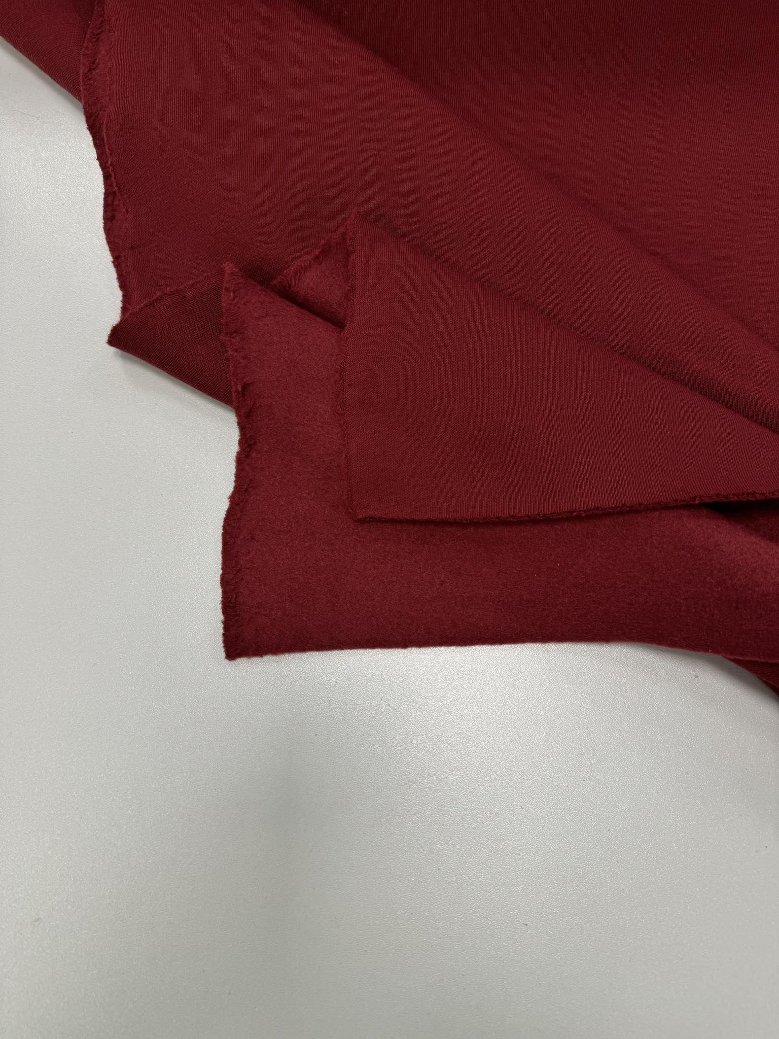 030a6b28-f0ed-449a-897c-eac06d61ff33.jpg Pašiltintas, storas trikotažas Burgundy — trikotažas | Trys Pelėdos