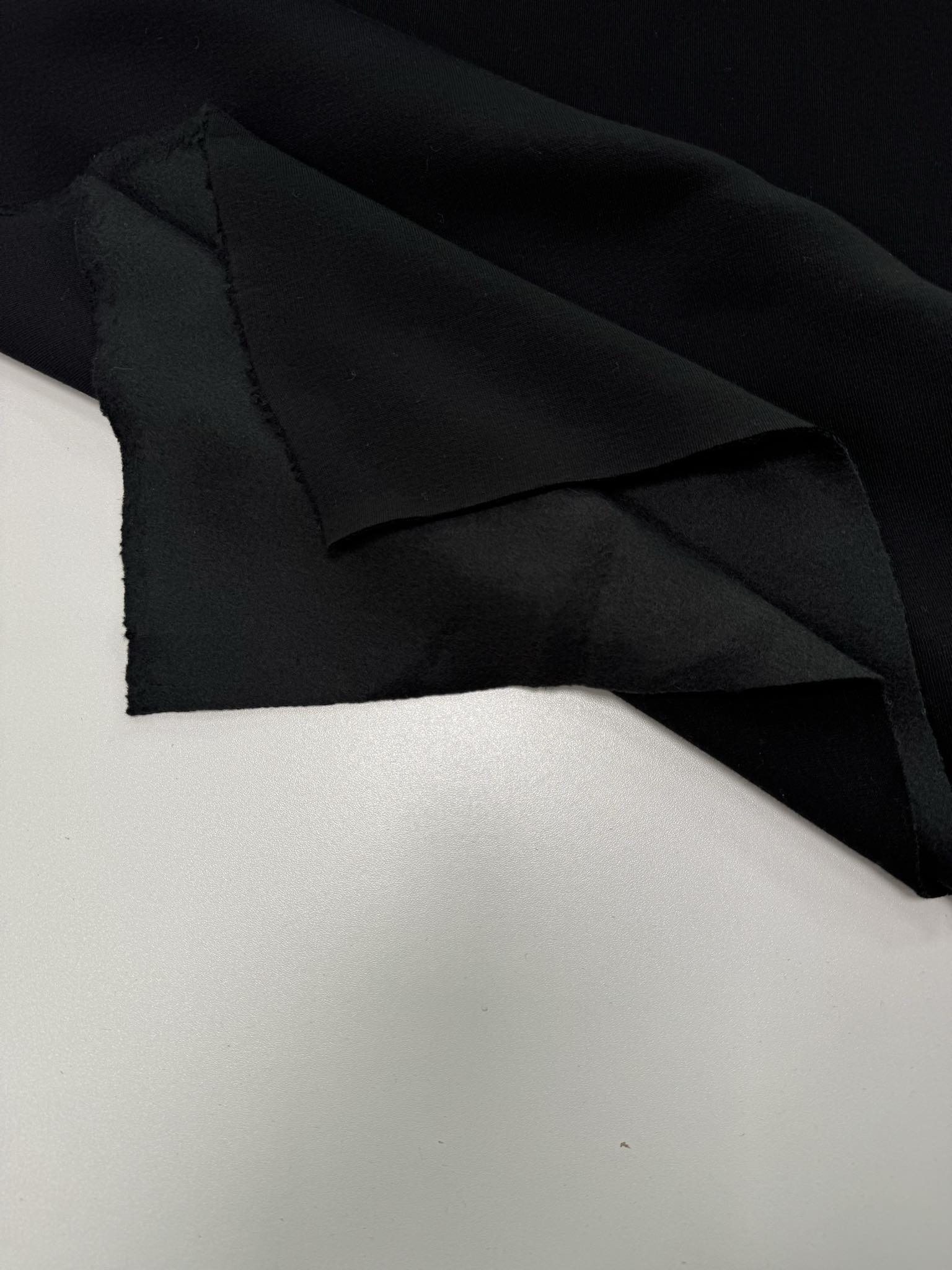 4a93c2db-6295-4b56-a8de-7abd494cae61.jpg Pašiltintas, storas trikotažas Black — trikotažas | Trys Pelėdos