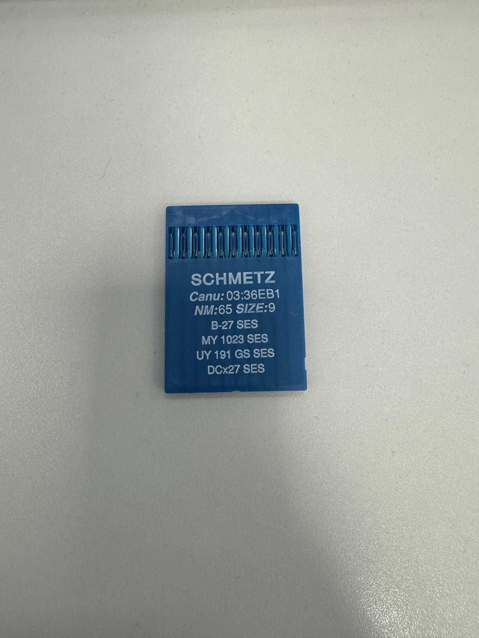 8b5e15b9-8224-404d-b915-e5283c809104.jpg Adatos pramoniniam overokui DCx27 SES (65/9), SCHMETZ — siuvimo adatos | Trys Pelėdos