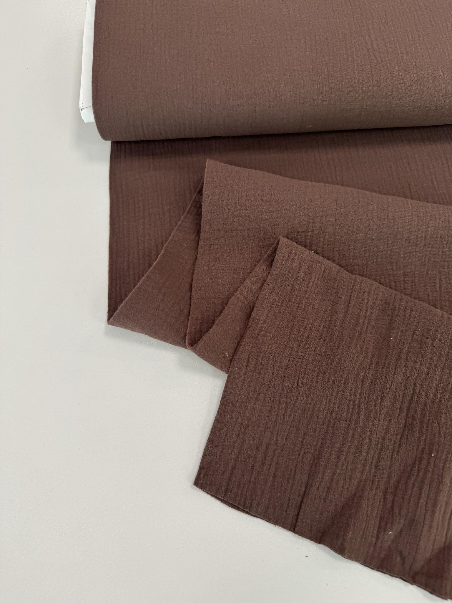 b3576999-a05b-41fa-960d-b2a4fdd01a08-rotated-1.jpg Medvilninis double gauze muslinas Rudas 43 — muslinas | Trys Pelėdos