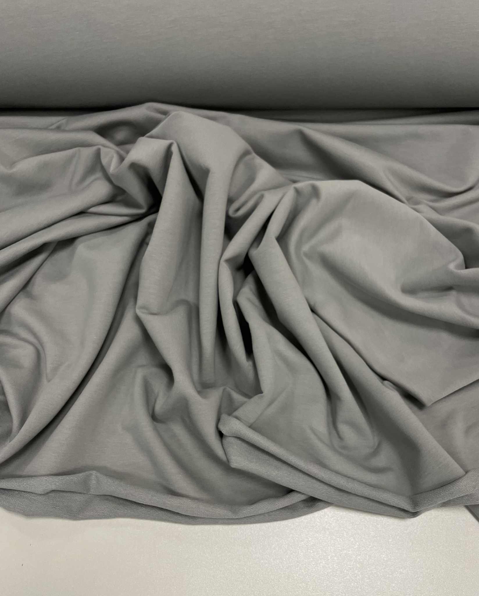Kilpinis trikotažas Grey stone, 250 g/m2 Kilpinis trikotažas Grey stone, 250 g/m2 — trikotažas | Trys Pelėdos