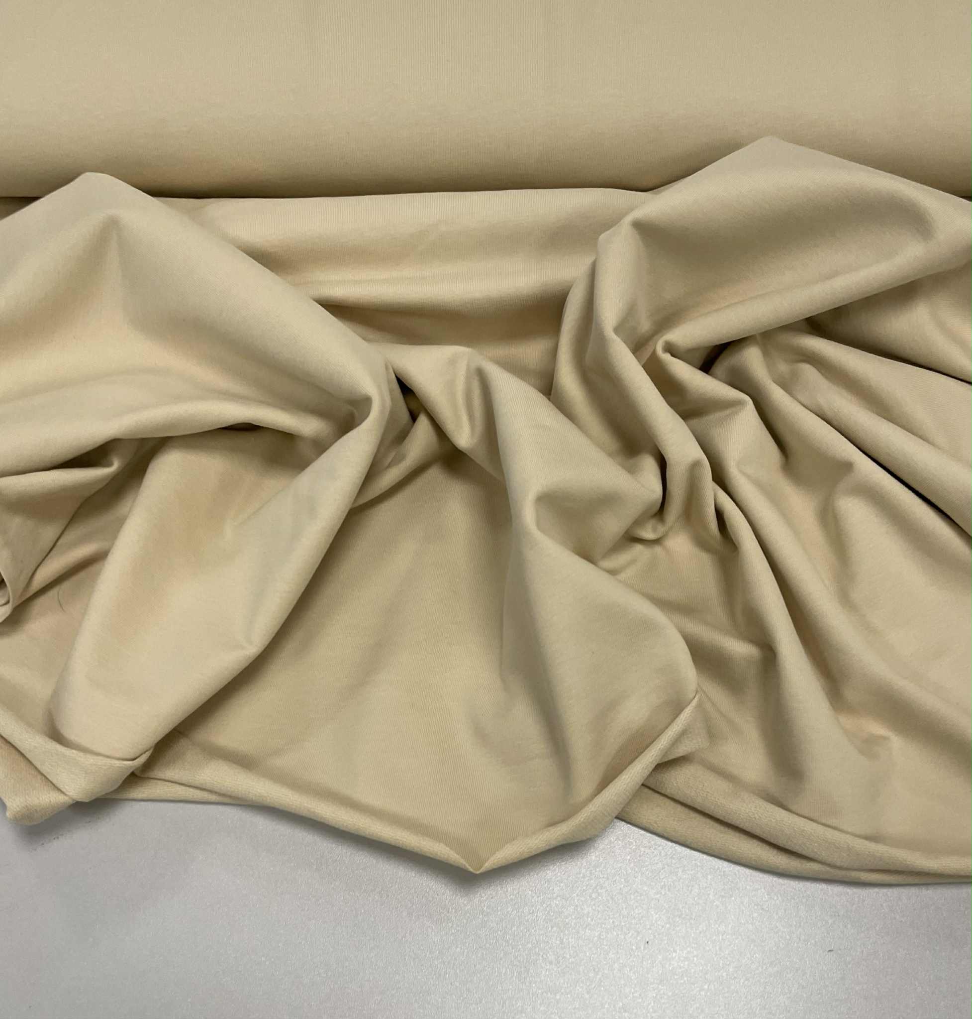 Kilpinis trikotažas Light sandbay, 250 g/m2 — trikotažas | Trys Pelėdos