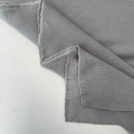 Pašiltintas, storas trikotažas Grey stone — trikotažas | Trys Pelėdos
