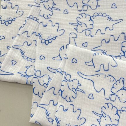 Medvilninis double gauze muslinas Dinozaurai Mėlyni