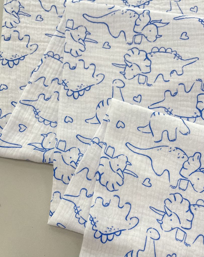 Medvilninis double gauze muslinas Dinozaurai Mėlyni