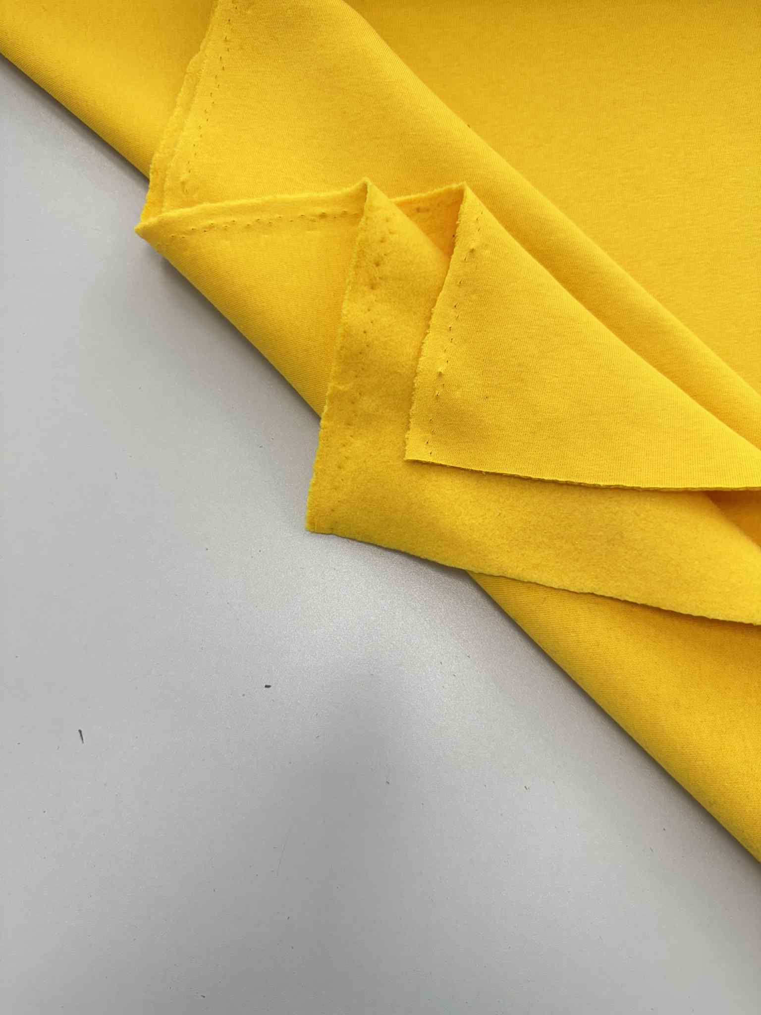 Pašiltintas, storas trikotažas Sunflower Pašiltintas, storas trikotažas Sunflower — trikotažas | Trys Pelėdos