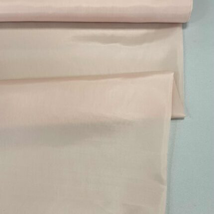 Pamušalinis audinys Šviesiai persikinė