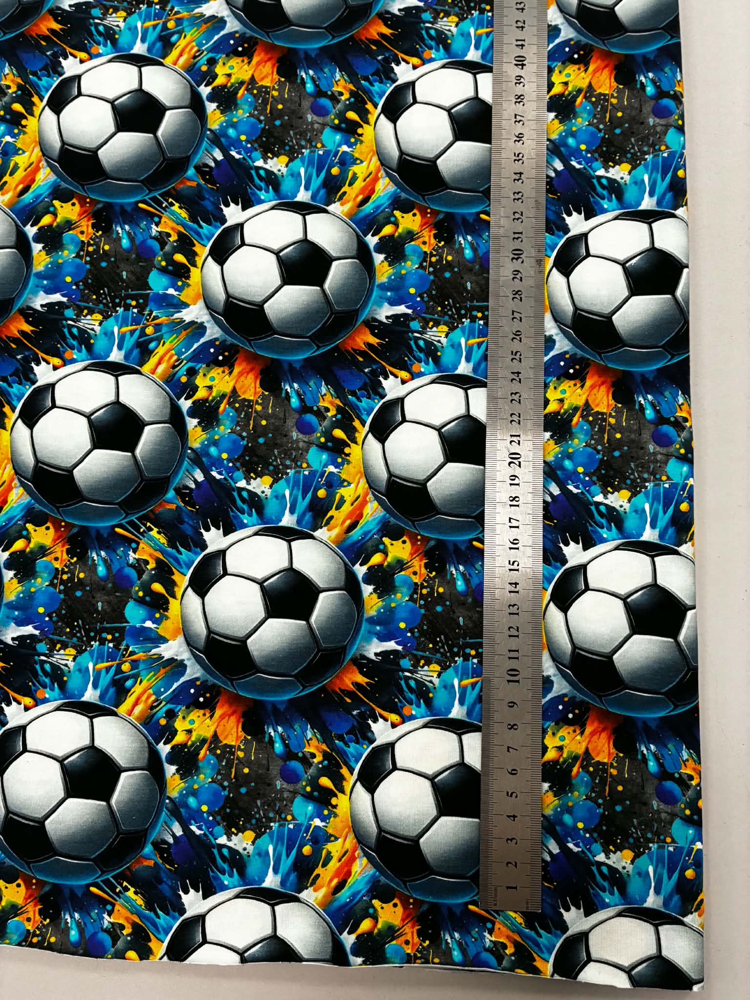 Jersio trikotažas su skaitmenine spauda Futbolo kamuoliai